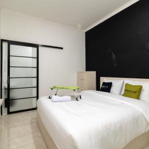 найти туры в отель Urbanview Hotel Bizhome Artha Gading Boulevard by RedDoorz отель Urbanview Hotel Bizhome Artha Gading Boulevard by RedDoorz