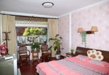 Wolong Inn 2*