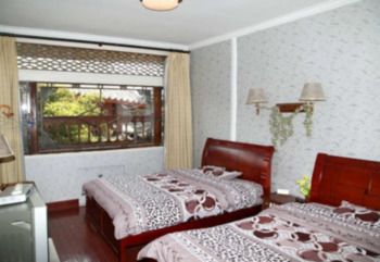 Wolong Inn 2*