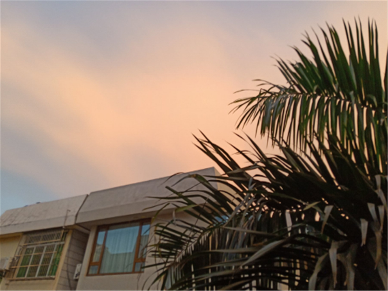 Haikou Green Orange Theme Hotel (Wuyue Plaza, East High-speed Railway Station) 2*