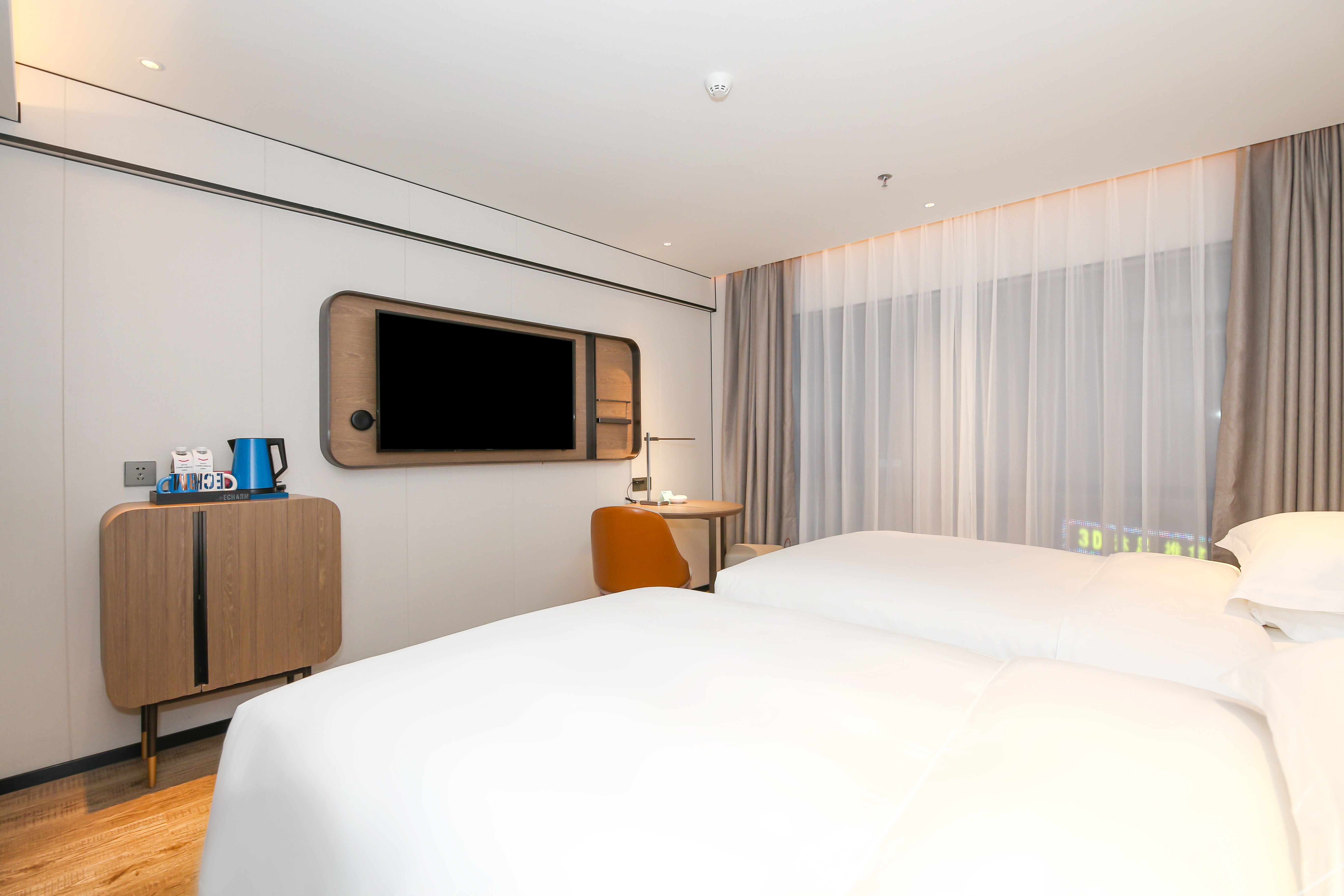 Echarm Hotel (Dongguan Guoji Qichecheng Lanqiuzhongxin) 3*