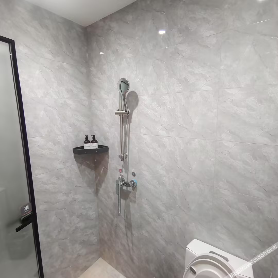 Junyi Hotel (Weifang Qingzhou Bus Station Taihua City) 2*