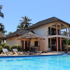 отель Zawadi Beach Villas