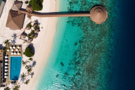 Отель Reethi Faru Resort в Раа Атолл - Мальдивы