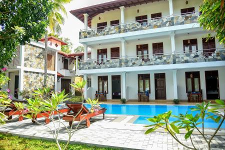 Отель Villa De White Sambur в Хиккадува - Шри-Ланка