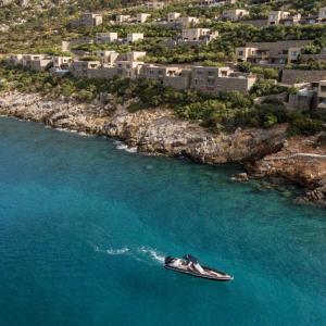 отель Daios Cove Luxury Resort & Villas