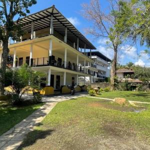 отель Rainbowswell Beach Resort