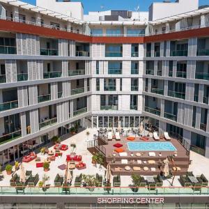 отель Hotel TQ Plaza