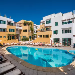 отель Porto Greco Village