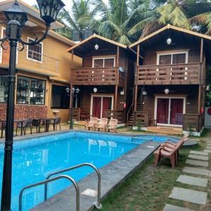 отель Wenzet Cottages