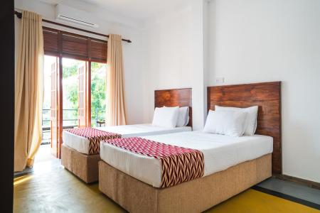 Отель Wimal Wood Stock Surf House в Велигама - Шри-Ланка