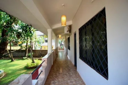 Отель Garden Villa 10 в Вагатор - Индия