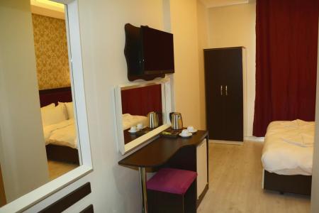 Отель Niconya Port Suites & Hotel в Бахчелиэвлер - Турция