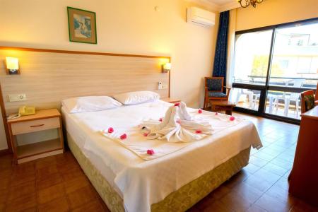 Отель Dogan Paradise Beach (Ozdere) в Гюмюлдур - Турция