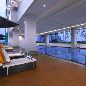 отель Harper M.T. Haryono