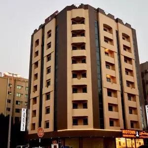 отель Midtown Furnished Apartments