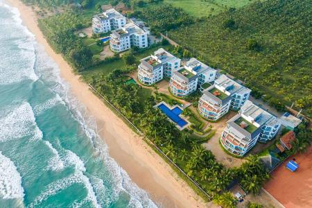 Отель Oceanfront Condominiums - Nilaveli в Нилавели - Шри-Ланка