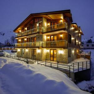 отель Pine Chalets