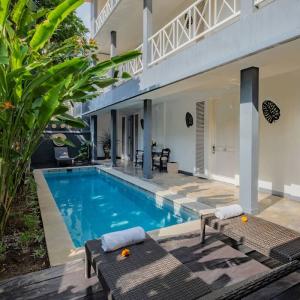 отель The Kanjeng Suites Petitenget