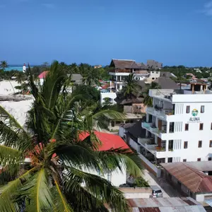 отель Aluna Beach Apartments