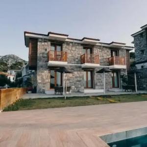 отель Alice Tatil Evi