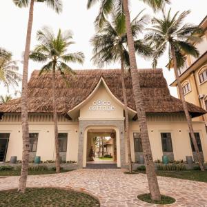 отель Coco Cottage Beachfront Resort