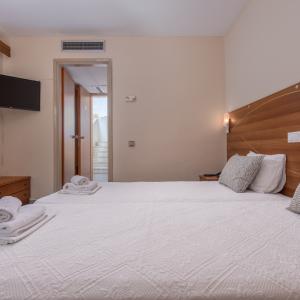 отель Dionysos Hotel & Suites