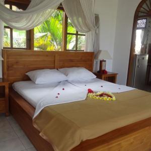 отель Hibiscus Cottages