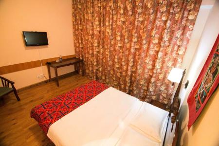 Отель Тагайтай в Каракол - Кыргызстан