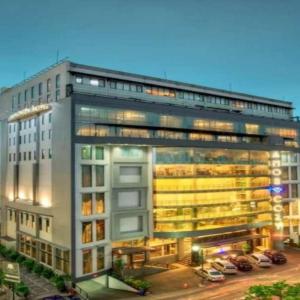 отель Amos Cozy Hotel & Convention Hall