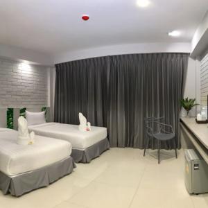 отель The Pat Hotel