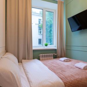 отель Moy Piter Sredneokhtinskaya Deluxe Apartments