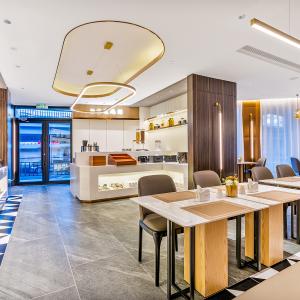 отель Homeinn Plus Hotel (Harbin Central Avenue Xinyang Road Airport Bus Station)