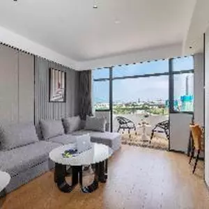 отель ELong Xicheng International Hotel(Haiya Colorful City Tongle South Subway Station Store)