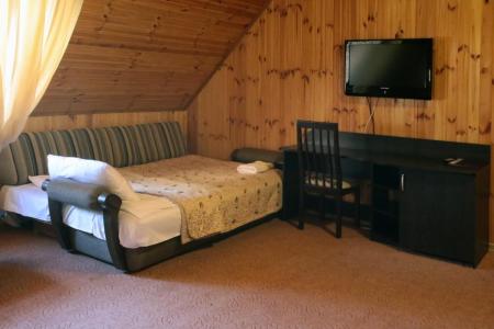 Отель Снежный Барс в Домбай - Россия