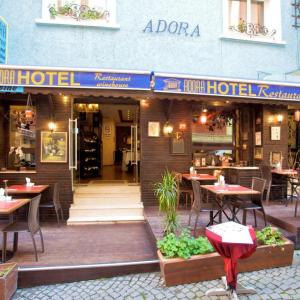отель Adora