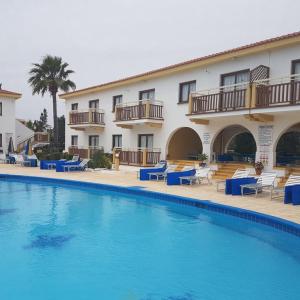 отель Cosmelenia Hotel Apartments