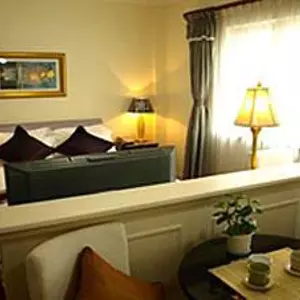 отель Ladoll Service Apartments