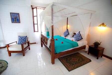 Отель Flame Tree Cottages в Нунгви - Танзания