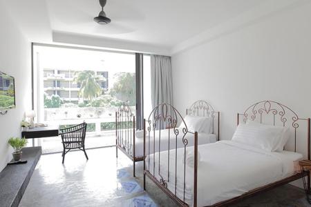 Отель Surintra Boutique Resort в пляж Сурин - Таиланд