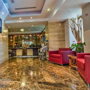 отель Executive Suites by Mourouj Gloria