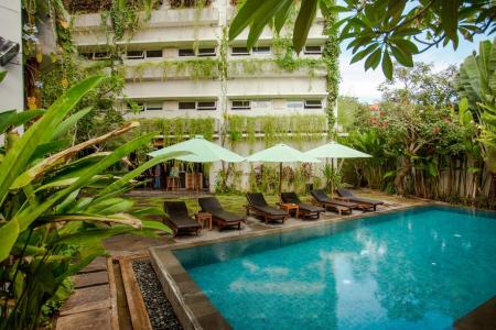 Отель GrandMas Plus Hotel Airport в Кута - Индонезия