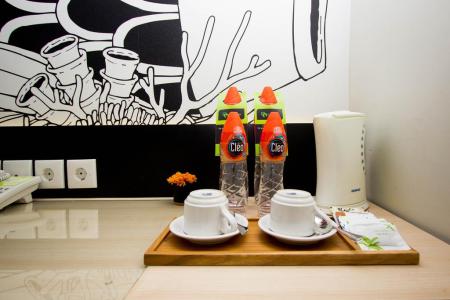 Отель GrandMas Plus Hotel Airport в Кута - Индонезия