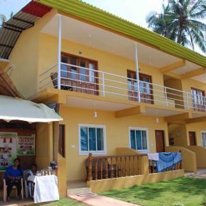 отель Sea Paradise Beach Cottages