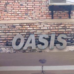 отель Oasis Beach Resort