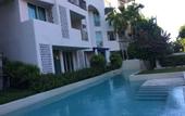 Туры в отель The Che Pool Access Beachfront Condo by Away