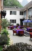 Туры в отель Qingshan Yunshe, earth village (Lijiang store, West Yangshuo Street)