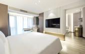 Туры в отель Kuanrong Suites Hotel (Liangjiang love sea shopping park)