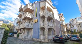 Apartments Tomy 4*